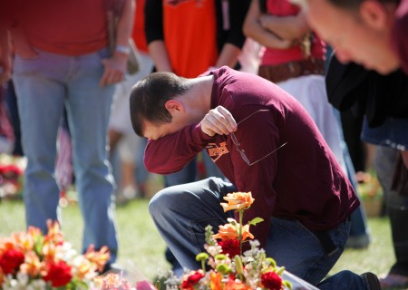 A student breaks down in tears after the