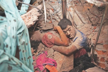 an and a woman clasped in a death grip