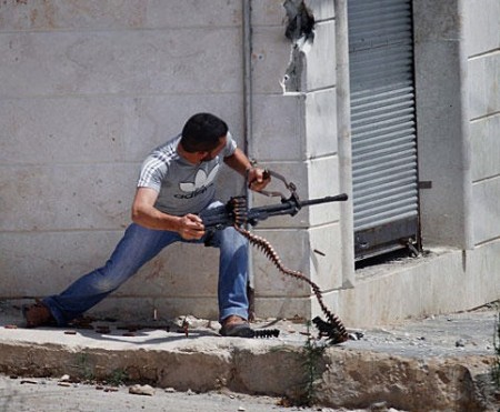 Syrian Rebel firing machine gun