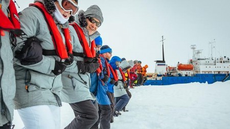Antarctic snow packed by feet to make a helicopter landing site