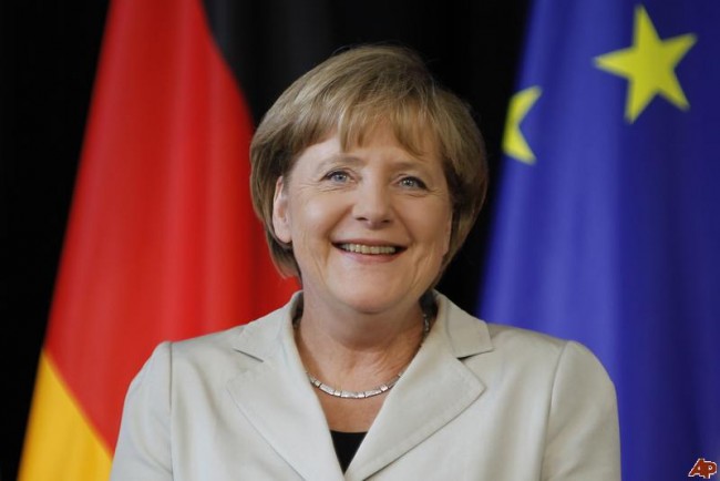 Angela Merkel Backs Juncker Merkel