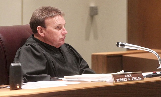 Judge Robert Warren Seeks to Fight Heroin Needles With Treatment Needles