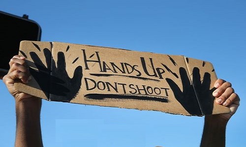 KKK Vows to Help Officer Accused of Shooting Unarmed Teen Michael Brown